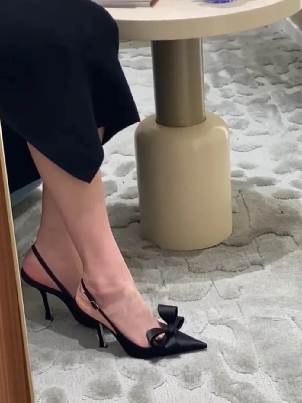 A Classy Chic Boutique Black Pointed Slingback Heels with Bow Accent